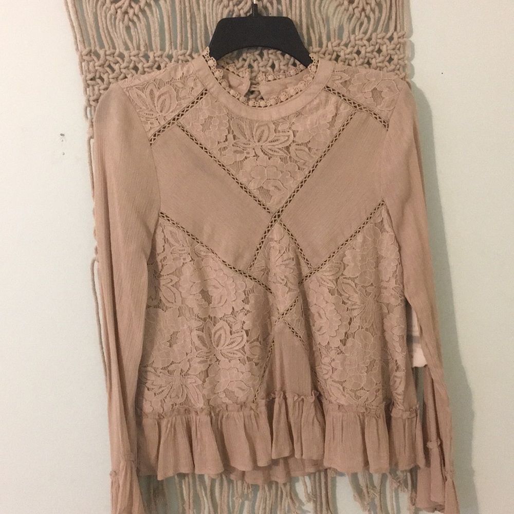 tan floral blouse